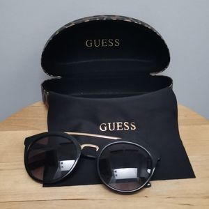 Guess black and gold sunglasses in used condition